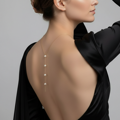 Fine pearl back chain worn down the spine