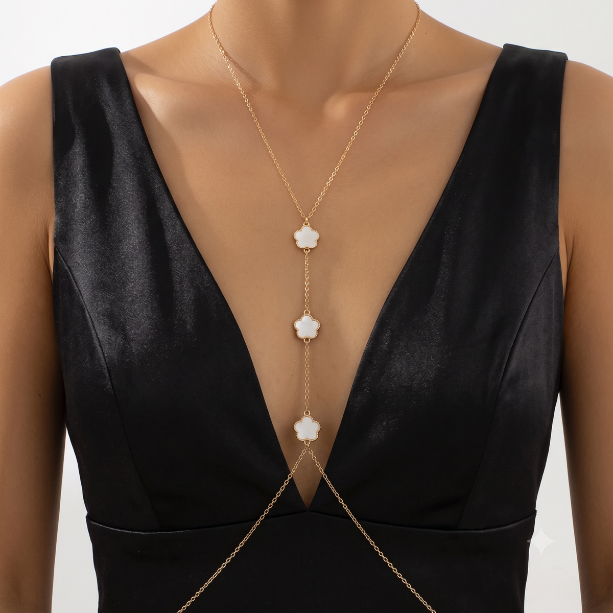 Ivory Bloom body chain with mother of pearl floral accents in gold-tone