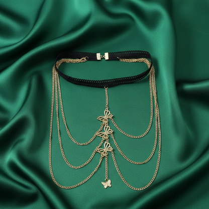 Butterfly motif thigh chain styled with a slit hem