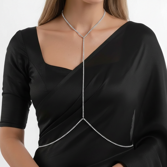 Silver-tone crystal line body chain worn with a corset top