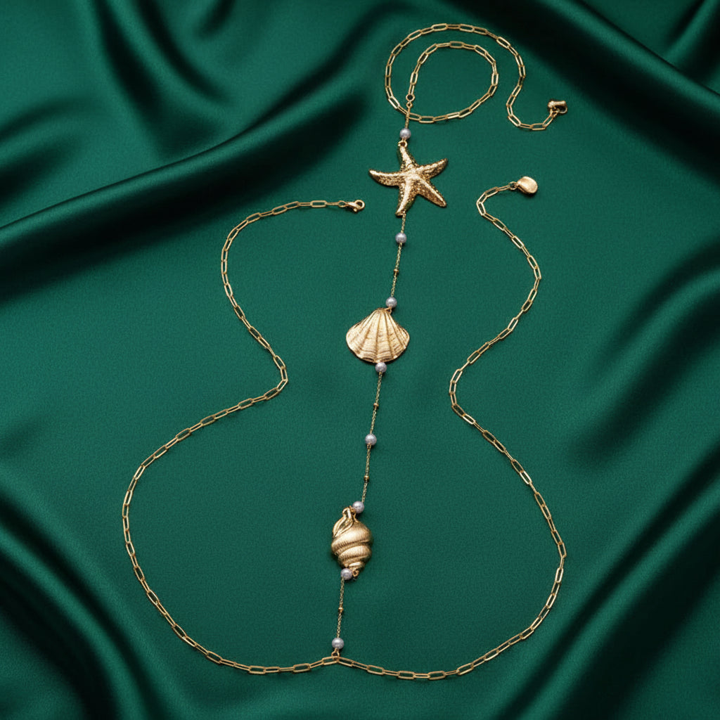 Marina Charm detail, starfish and seashell charms in gold-tone
