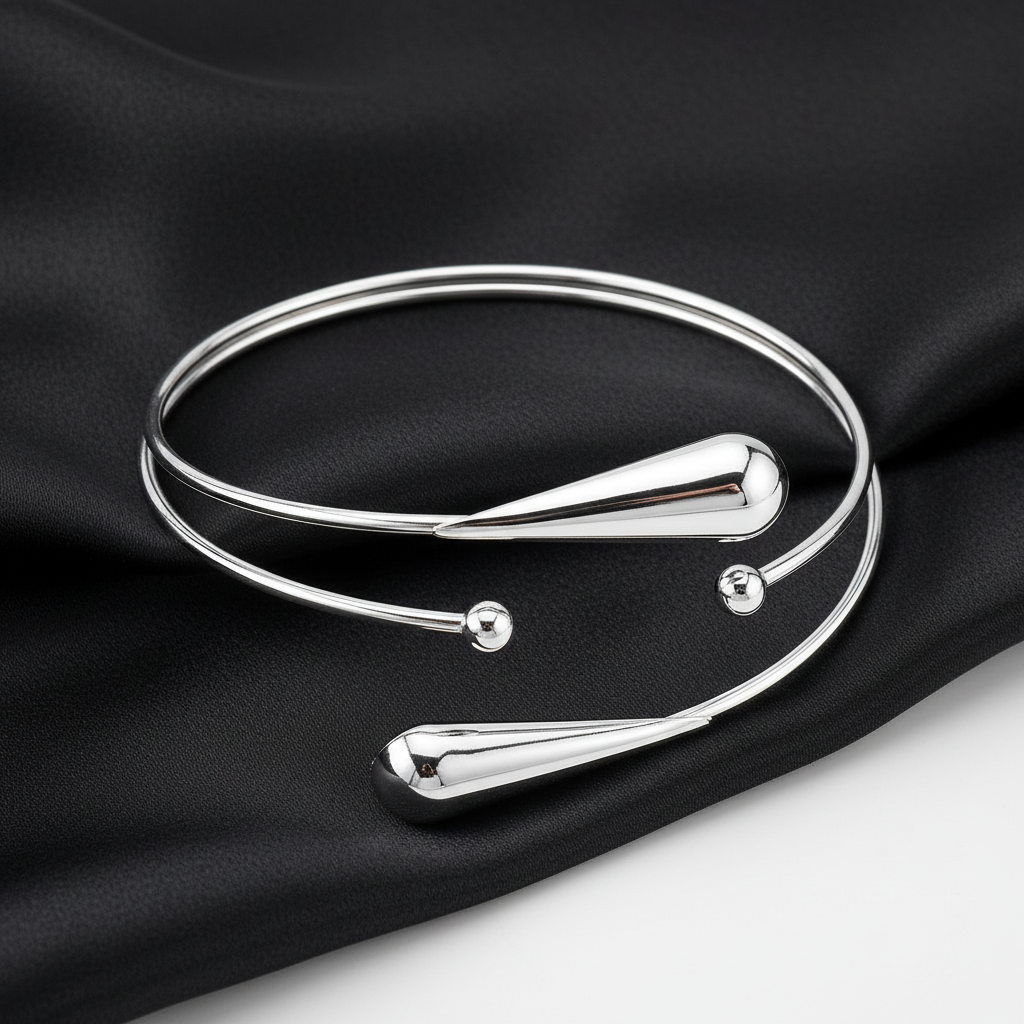 Teardrop arm cuff in silver-tone by ReevaTara