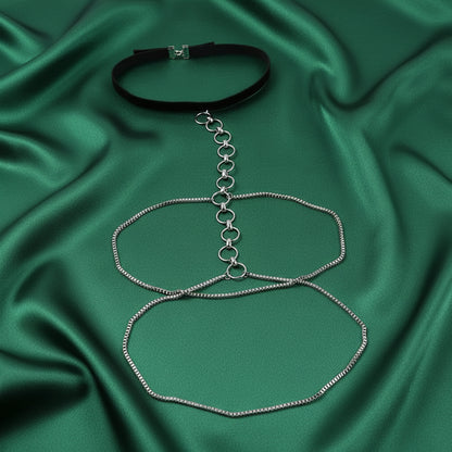 Structured link thigh chain styled with a slit dress