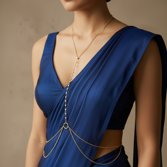 Crystal drop body chain worn with a plunging neckline